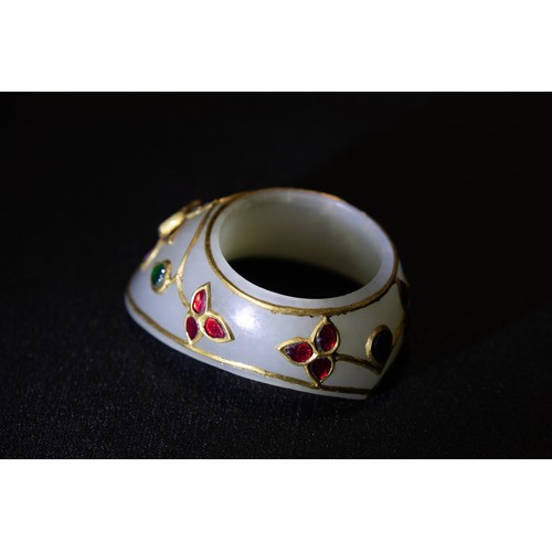 297 - An Indian Mughal Jade Archer Ring Decorated with Floral Patterns in  Ruby Gemstones, Polki Diamond &... 