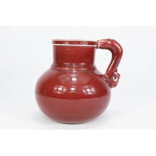 125 - A Chinese Lava Glazed Porcelain Pitcher with 6 Character Figures to the Base.

H: Approximately 15cm