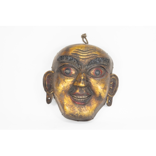 64 - A Tribal Tibetan Bronze Buddhist Wall Hanging Mask from the 19th Century.

Approximately 31cm x 30cm... 