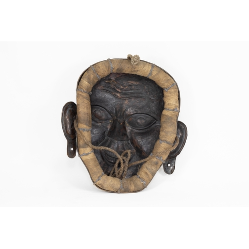 64 - A Tribal Tibetan Bronze Buddhist Wall Hanging Mask from the 19th Century.

Approximately 31cm x 30cm... 