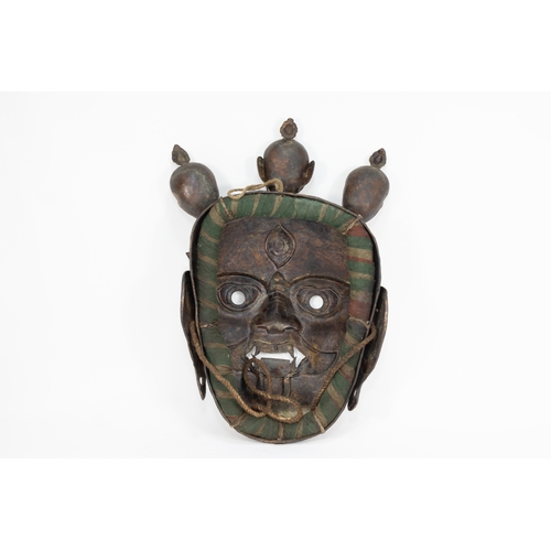 65 - A Tribal Tibetan Bronze Buddhist Wall Hanging Mask from the 19th Century.

Approximately 39cm x 26.3... 