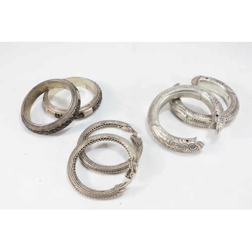 335 - A Collection of 3 Tribal Chinese Tibetan White Metal Bangles.

303g