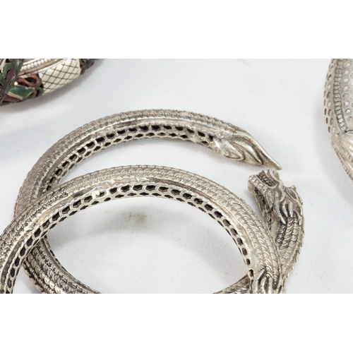 335 - A Collection of 3 Tribal Chinese Tibetan White Metal Bangles.

303g