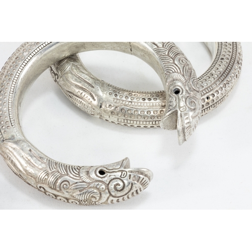 335 - A Collection of 3 Tribal Chinese Tibetan White Metal Bangles.

303g