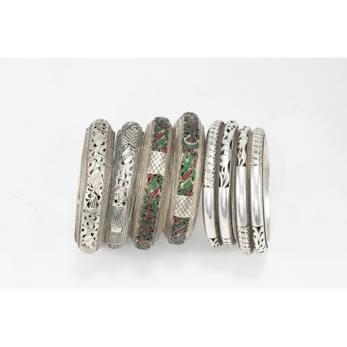 335 - A Collection of 3 Tribal Chinese Tibetan White Metal Bangles.

303g