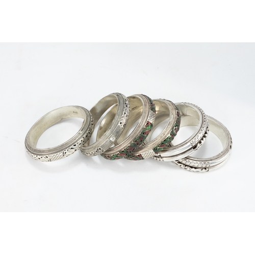 335 - A Collection of 3 Tribal Chinese Tibetan White Metal Bangles.

303g