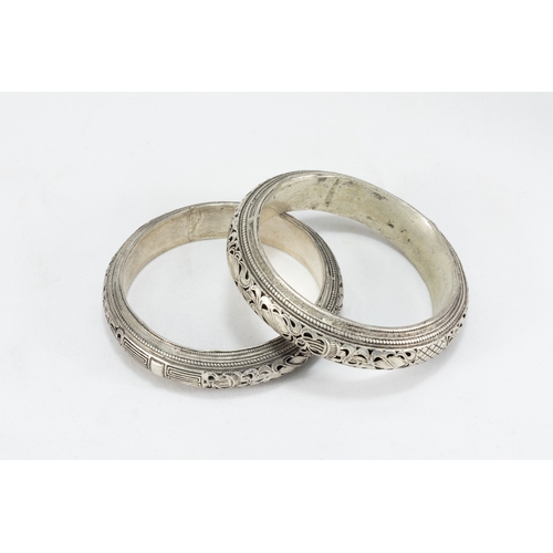 335 - A Collection of 3 Tribal Chinese Tibetan White Metal Bangles.

303g