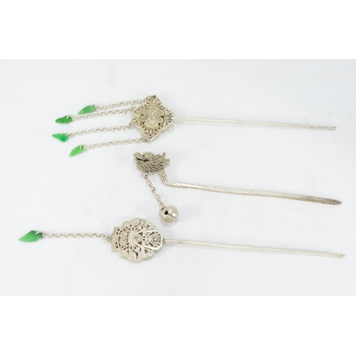 342 - A Lot of 3 Chinese Tibetan Hair Sticks with Green Jade Tassels.

L: Approximately 21cm, 23.2cm, 24.6... 