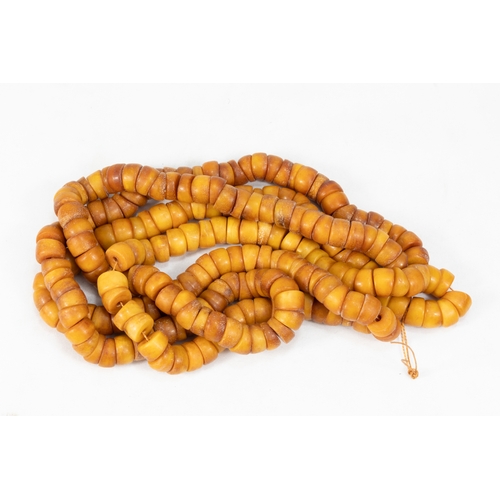 346 - A Pair of Tribal Moroccan Amber Coloured Beads Necklaces.

Half breaded length: Approximately 31cm &... 