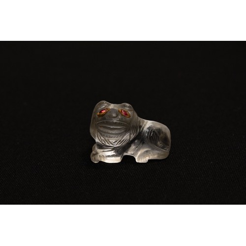 209 - A Rare Islamic Mughal Rock Crystal Figure of a Seated Lion with Ruby Eyes from the 16th Century.

L:... 