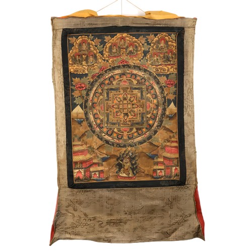 67 - A Tibetan Mandala Thangka Painting from the Early 20th Century.

Approximately 45cm x 33cm