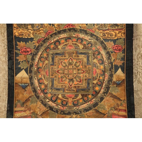 67 - A Tibetan Mandala Thangka Painting from the Early 20th Century.

Approximately 45cm x 33cm