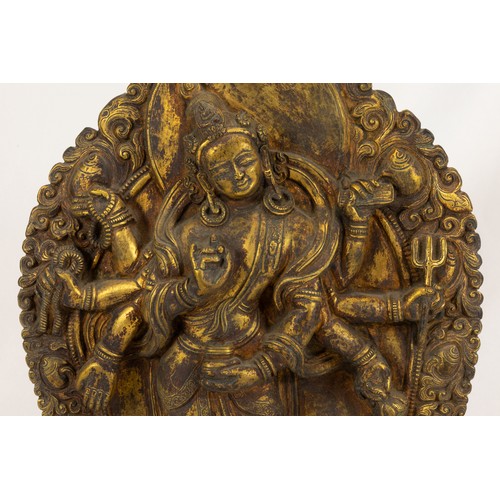 69 - A Rare Tibetan Bronze Gilt Plaque of an Eight-Armed Avalokiteshvara from Early 19th Century.

H: App... 