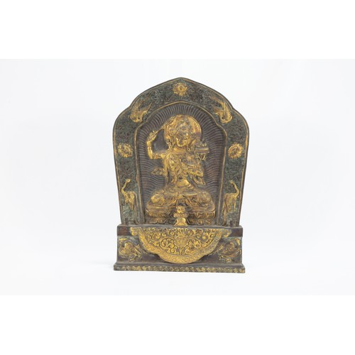 70 - A Rare Tibetan Bronze Gilt Plaque of Manjushri Bodhisattva from the Early 19th Century.

H: Approxim... 