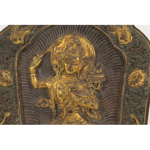 70 - A Rare Tibetan Bronze Gilt Plaque of Manjushri Bodhisattva from the Early 19th Century.

H: Approxim... 