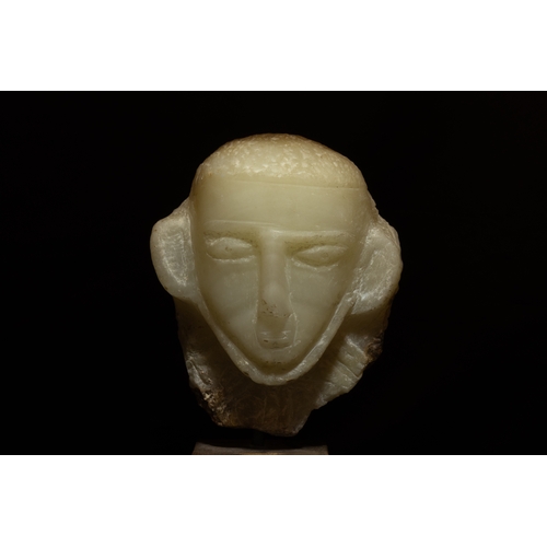 37 - An Islamic South Arabian Alabaster Head of a Deity from the 2nd Century Decorated with Engraving Und... 