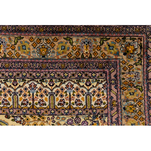 77 - A Persian Qum Hand-knotted Silk Rug from the 19th Century with a Floral Patterned Design.

Approxima... 