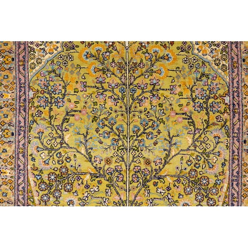 77 - A Persian Qum Hand-knotted Silk Rug from the 19th Century with a Floral Patterned Design.

Approxima... 