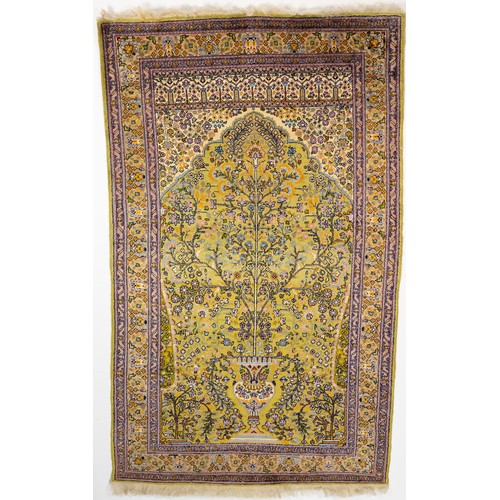 77 - A Persian Qum Hand-knotted Silk Rug from the 19th Century with a Floral Patterned Design.

Approxima... 