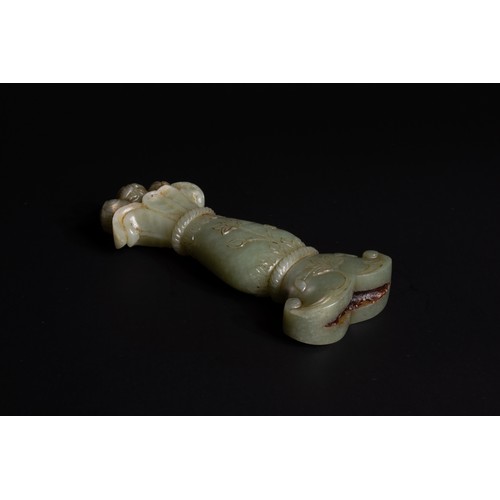 299 - An Indian Mughal Jade Handle Carved with Floral Patterns.

H: Approximately 13.5cm