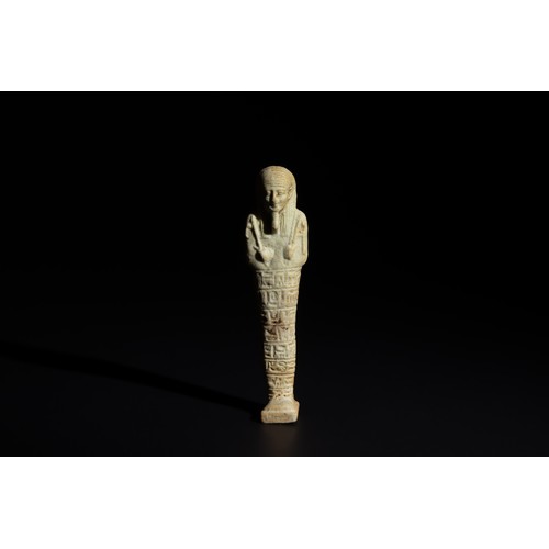 165 - An Egyptian Faience Ushabti Circa 625 B.C. Inscribed with Hieroglyphs.

H: Approximately 9.8cm

Prov... 