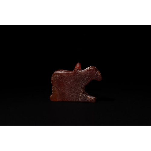 189 - An Egyptian Carnelian/ Agate Amulet of a Standing Ram, Circa 300 B.C.

H: Approximately 2.7cm
L: App... 