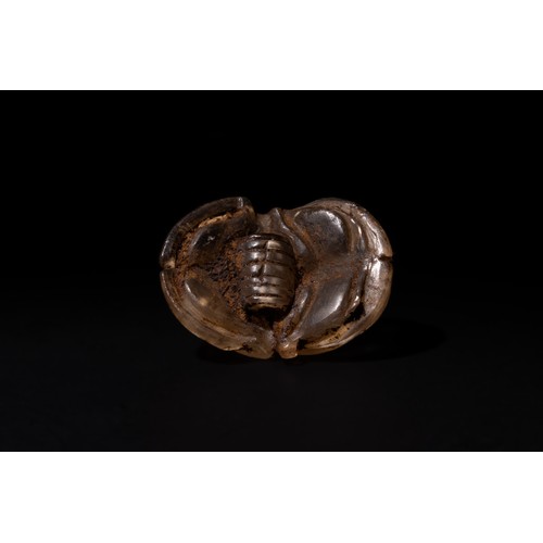 190 - An Egyptian Rock Crystal Scarab in the Form of a Pendant, Early Ptolemaic Period.

L: Approximately ... 