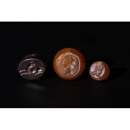 3 - **NO RESERVE**

A Lot of 3 Sassanian Style Seals. 

2 made from agate, 1 made from black stone. 

H:... 