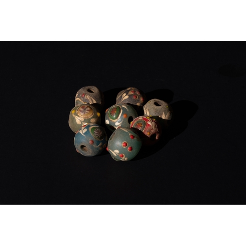 9 - **NO RESERVE** 

A Lot of 8 Persian Glass Beads Possibly Safavid.

H: Approximately 1.5cm

Private C... 