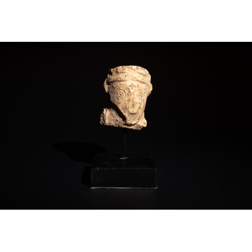 242 - An Ancient Near Eastern White Stone Head, 3rd-2nd Millennium B.C.

Approximately 5cm x 4.2cm x 2.6cm... 