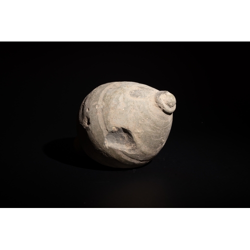 244 - A Byzantine Ceramic Hand Grenade Circa 9th-11th Century AD.

Approximately 14cm x 8.2cm 

Provenance... 