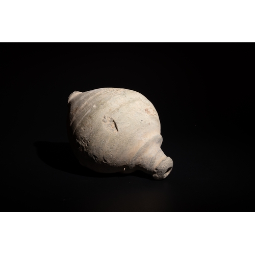 244 - A Byzantine Ceramic Hand Grenade Circa 9th-11th Century AD.

Approximately 14cm x 8.2cm 

Provenance... 