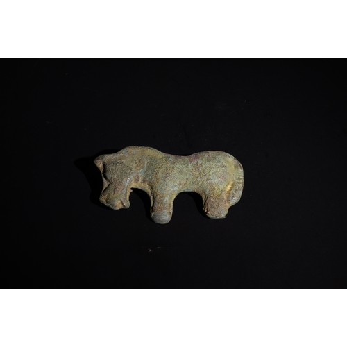 246 - An Ordos Bronze Animal Mount, Probably a Horse, 6th-2nd Century A.D.

Approximately 8.6cm x 4.5cm

P... 