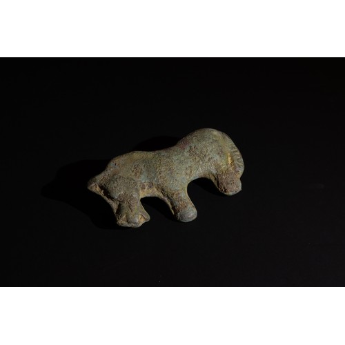 246 - An Ordos Bronze Animal Mount, Probably a Horse, 6th-2nd Century A.D.

Approximately 8.6cm x 4.5cm

P... 