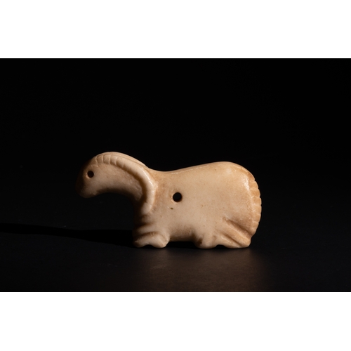 252 - A Near Eastern Marble Figure of a Mountain Goat Possibly Ancient.

Approximately 7.2cm x 3.8cm