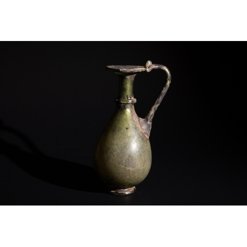 256 - A Roman Pale Green Glass Jug Circa 4th Century.