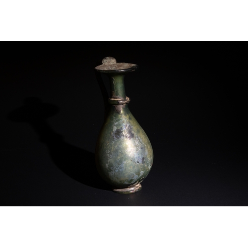 256 - A Roman Pale Green Glass Jug Circa 4th Century.