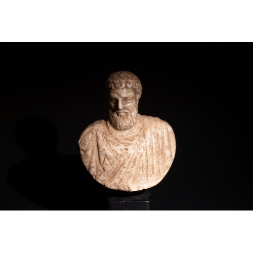 257 - A Roman Stone Bust of Probably Hercules.

H: Approximately 12.5cm
H with stand: Approximately 17cm