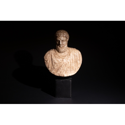 257 - A Roman Stone Bust of Probably Hercules.

H: Approximately 12.5cm
H with stand: Approximately 17cm