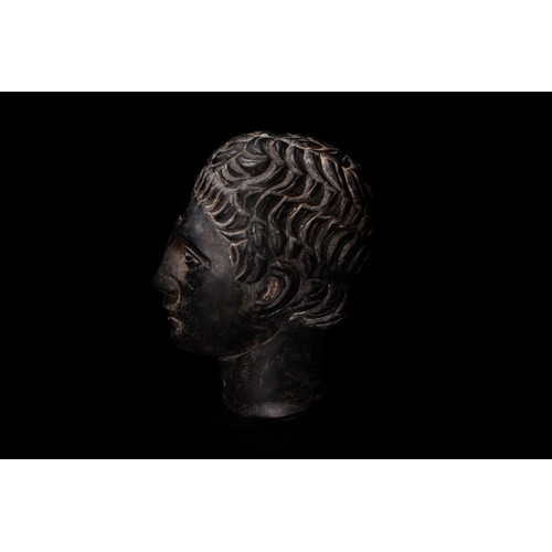 258 - A Roman Style Hardstone Head of a Young Lady, 2nd Century or Later.

H: Approximately 9.5cm

Provena... 