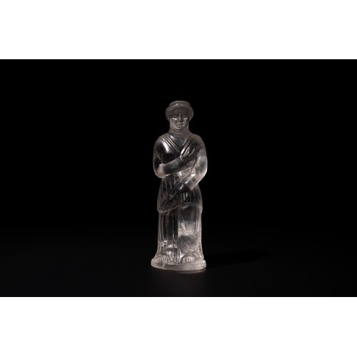 259 - A Roman Rock Crystal Standing Figure of a Lady, 2nd-3rd Century.

H: Approximately 6.5cm

Provenance... 