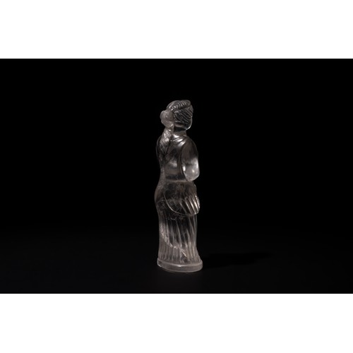 259 - A Roman Rock Crystal Standing Figure of a Lady, 2nd-3rd Century.

H: Approximately 6.5cm

Provenance... 