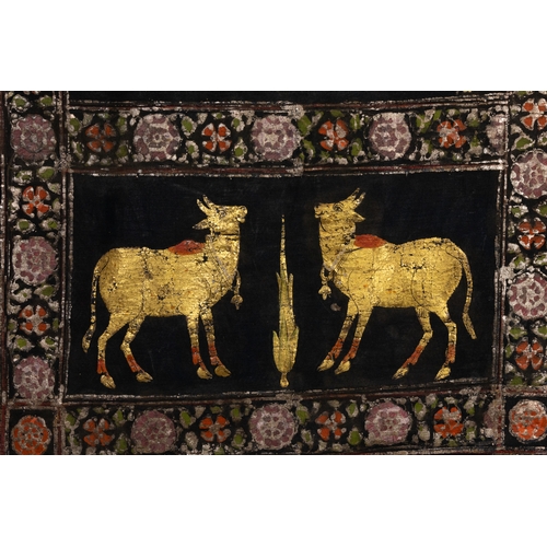 79 - An Indian Gold Pichwai Painting Decorative Panel Depicting Peacocks and Cows, 20th Century.

Approxi... 