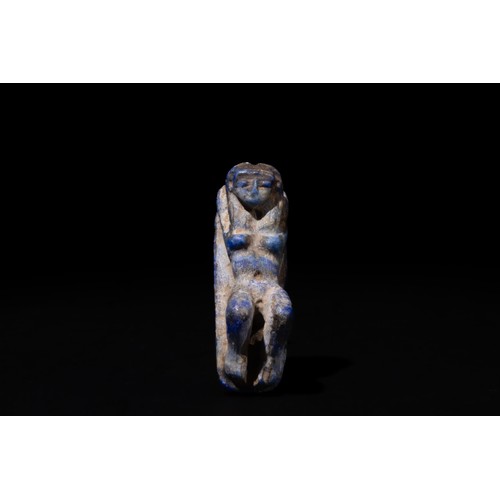 201 - An Egyptian Lapis Lazuli Reclining Naked Woman in the Form of an Amuletic Pendant, Circa Mid 1st Mil... 