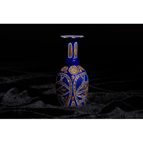 117 - A Bohemian Enamelled Blue Glass Perfume Bottle, Made for the Persian Export Market, 19th Century.

H... 