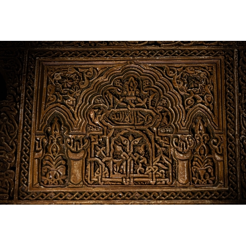 132 - An Islamic Alhambra Moulded Plaster Decorated with Islamic Inscriptions. 

Approximately 32cm x 27cm