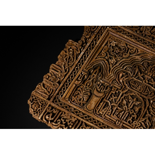 132 - An Islamic Alhambra Moulded Plaster Decorated with Islamic Inscriptions. 

Approximately 32cm x 27cm