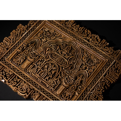 132 - An Islamic Alhambra Moulded Plaster Decorated with Islamic Inscriptions. 

Approximately 32cm x 27cm