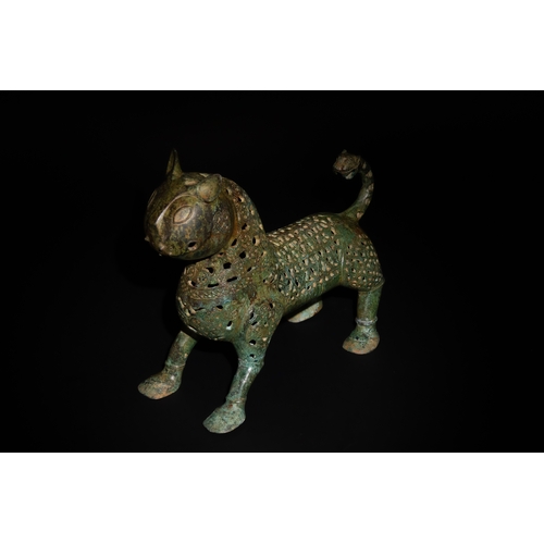 139 - An Islamic Bronze Lion Decorated with Intricate Openwork.

H: Approximately 27.5cm
L: Approximately ... 