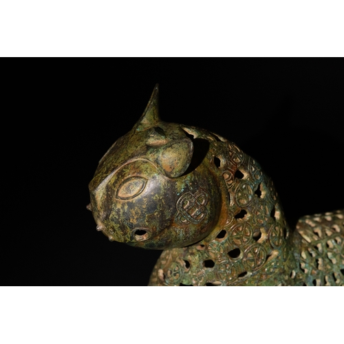 139 - An Islamic Bronze Lion Decorated with Intricate Openwork.

H: Approximately 27.5cm
L: Approximately ... 